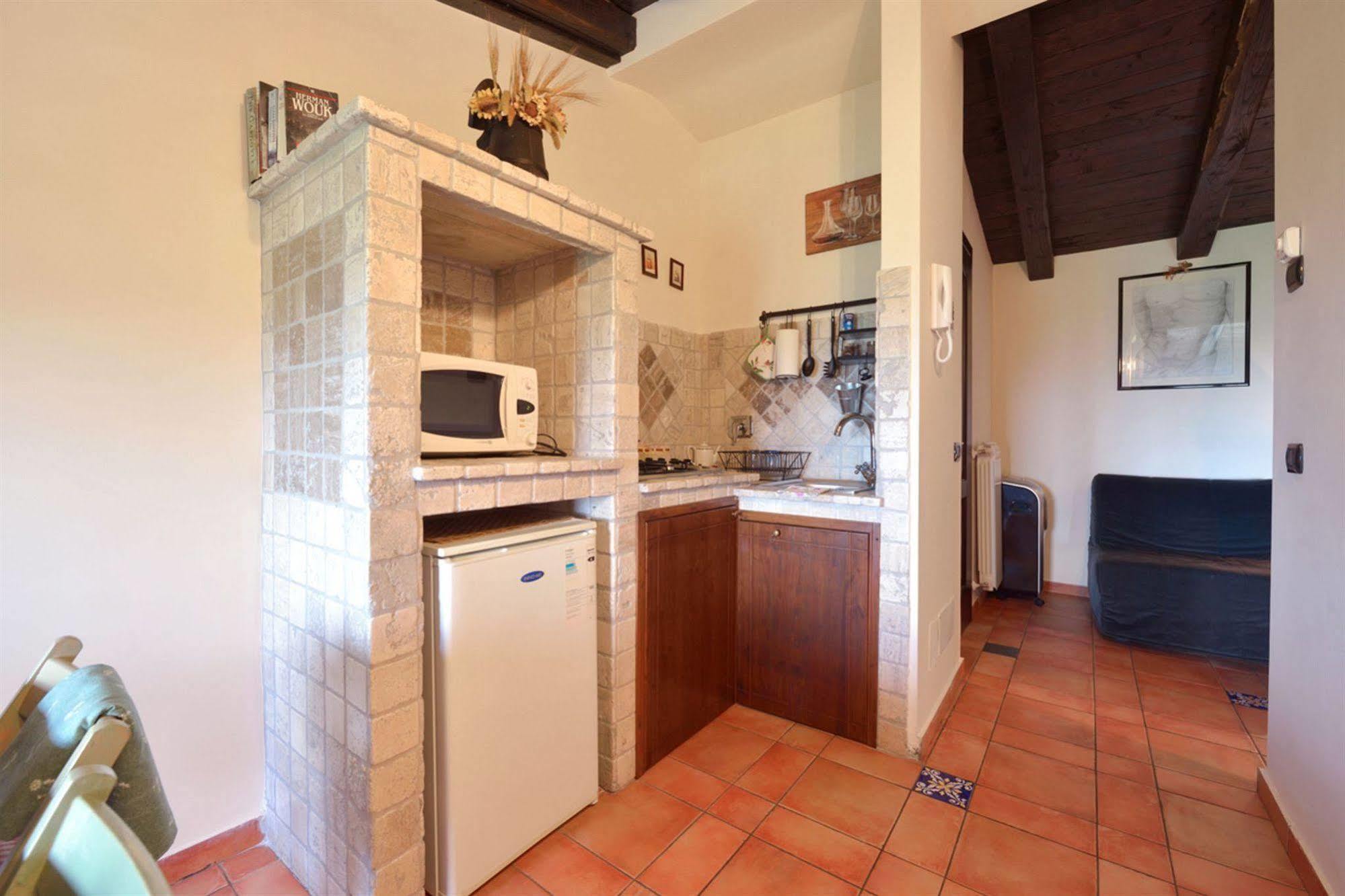 Aparthotel Il Casale Delle Ginestre à Castel San Pietro Romano Extérieur photo