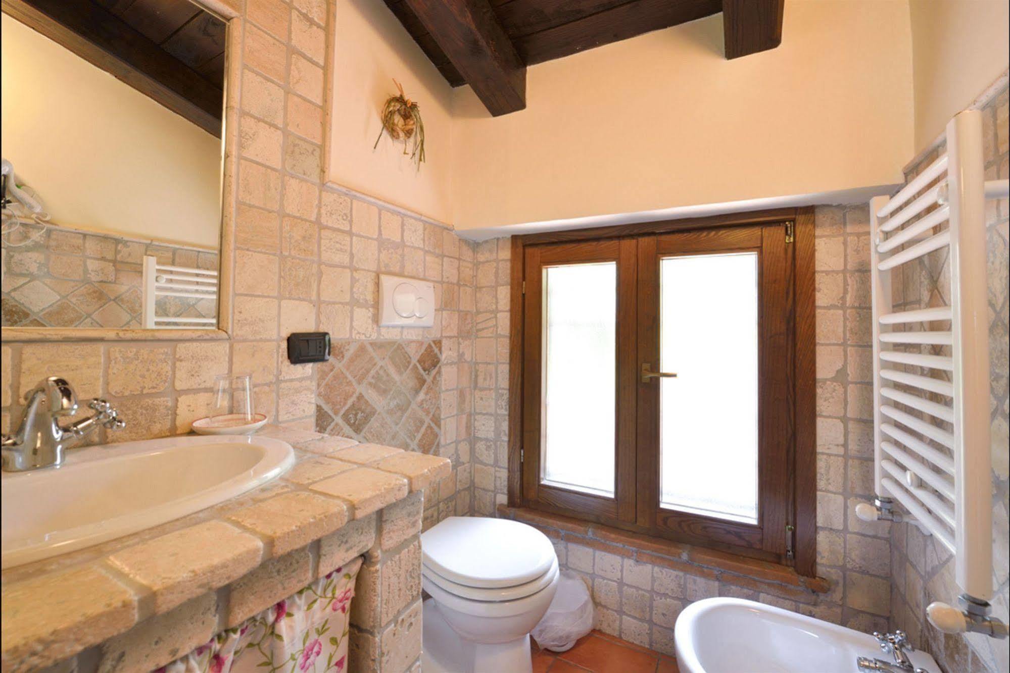 Aparthotel Il Casale Delle Ginestre à Castel San Pietro Romano Extérieur photo